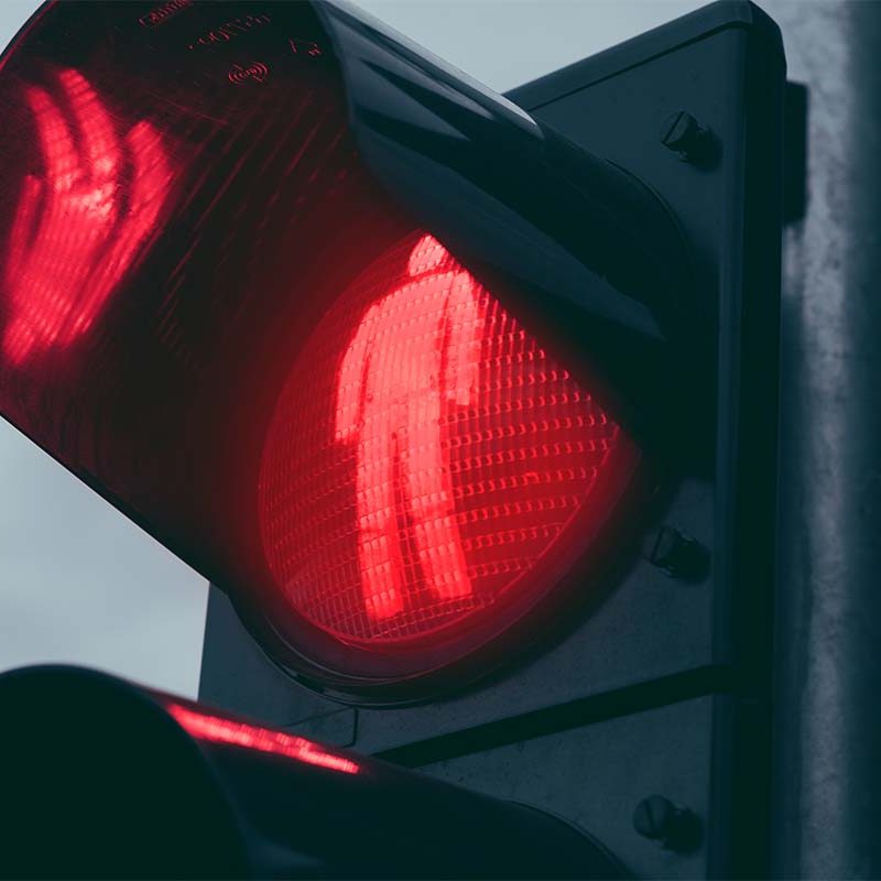 red-traffic-light-for-pedestrians-tort-liability@1200w